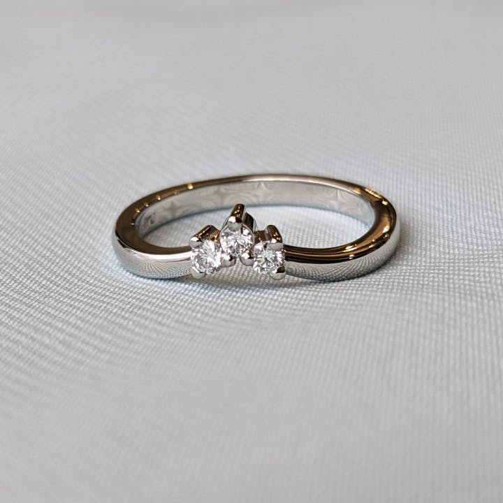 3 stone engagement ring small diamonds.jpg