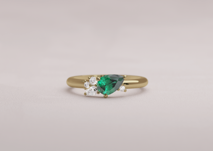 Dainty Asymmetri Emerald Engagement Ring
