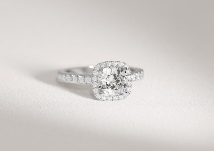 Cushion Cut Engagement Ring with Halo and Pave in a Platinum Band