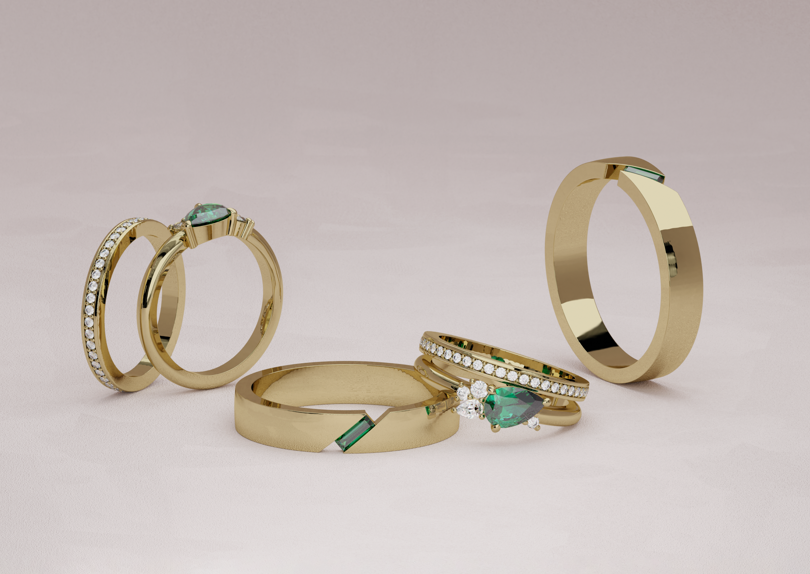 His and hers yellow gold bridal set featuring diamonds and emeralds