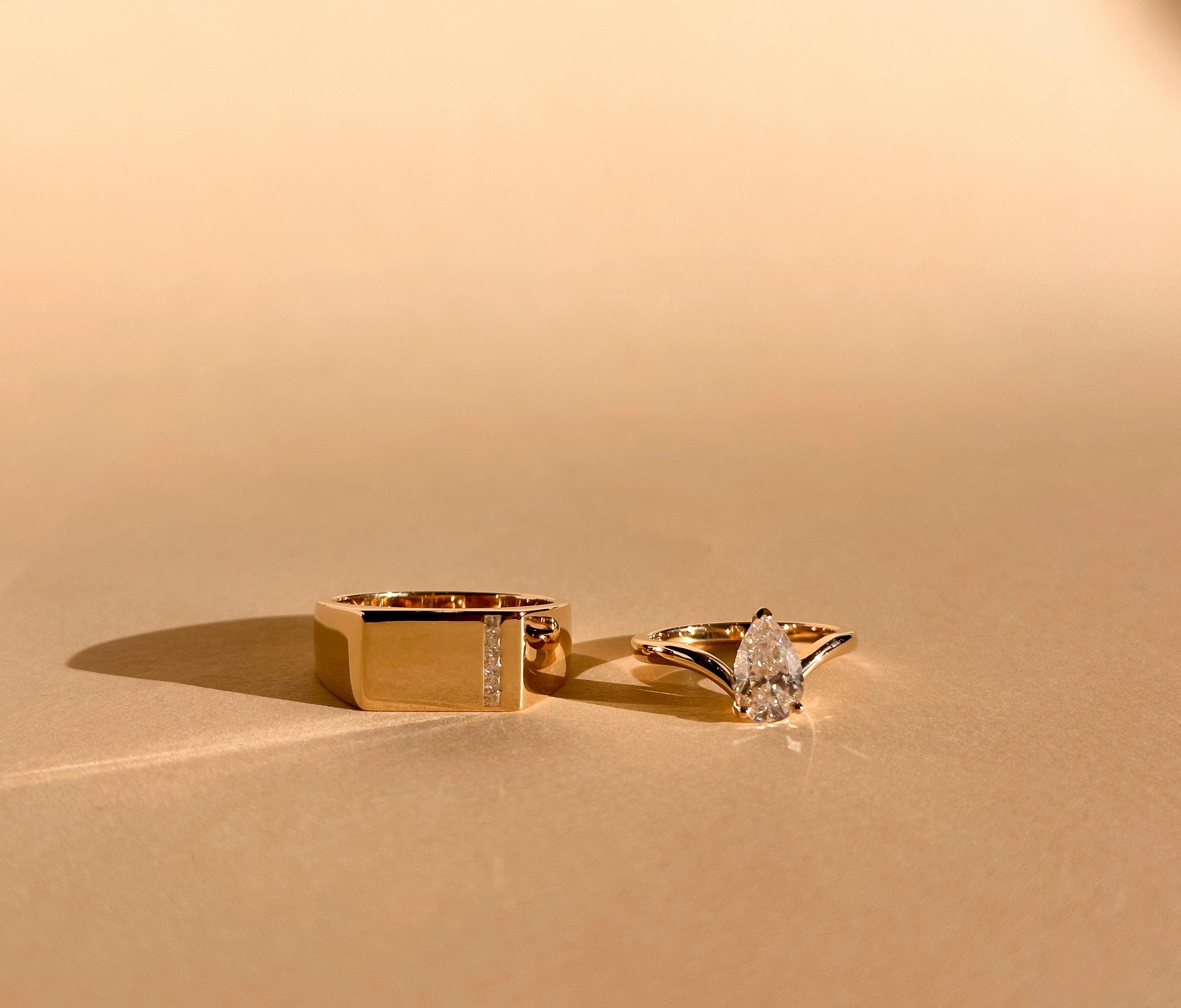 Diamond and yellow gold his and hers engagement ring set