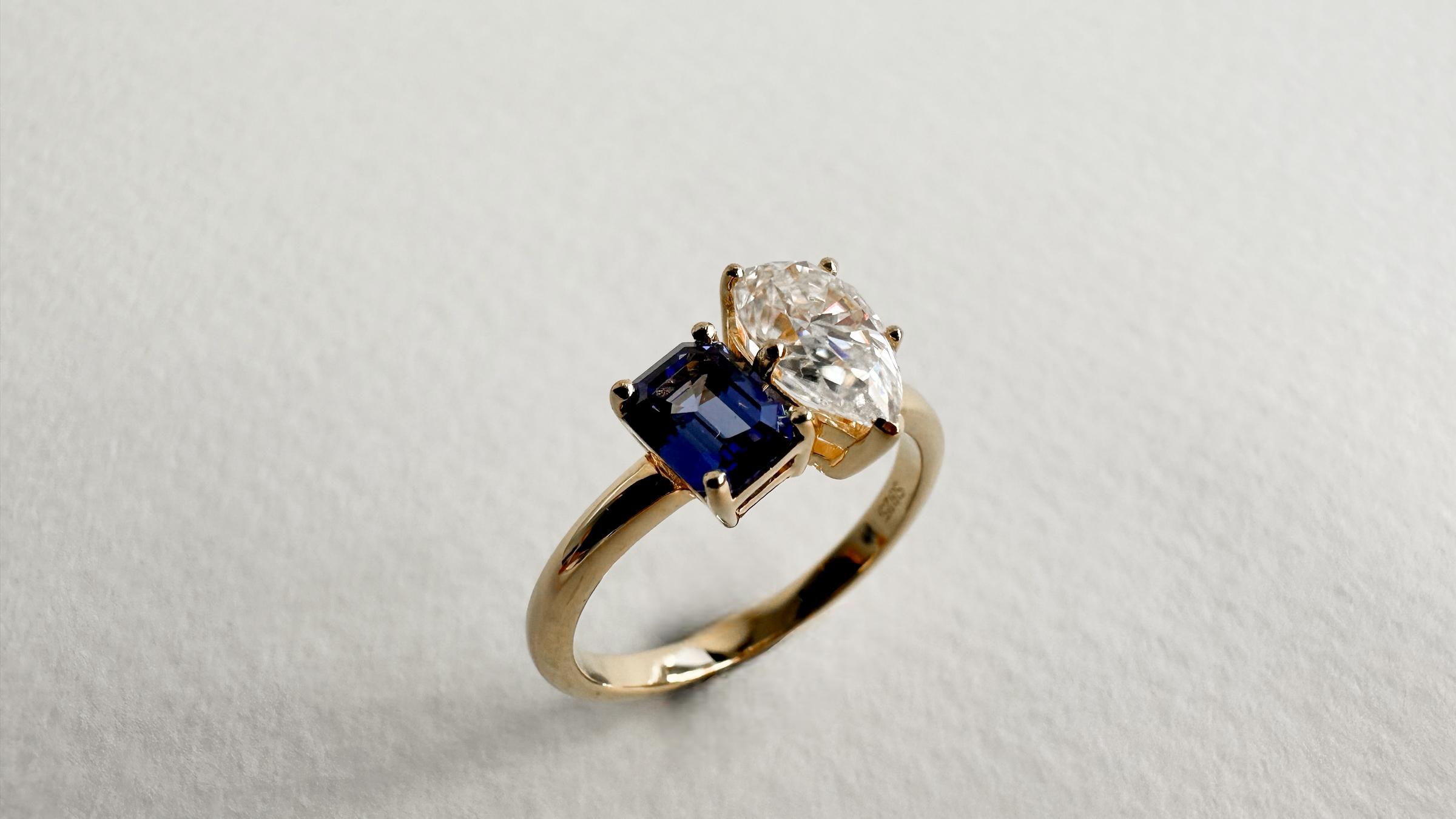 Toi et moi diamond and blue sapphire engagement ring in 14K yellow gold