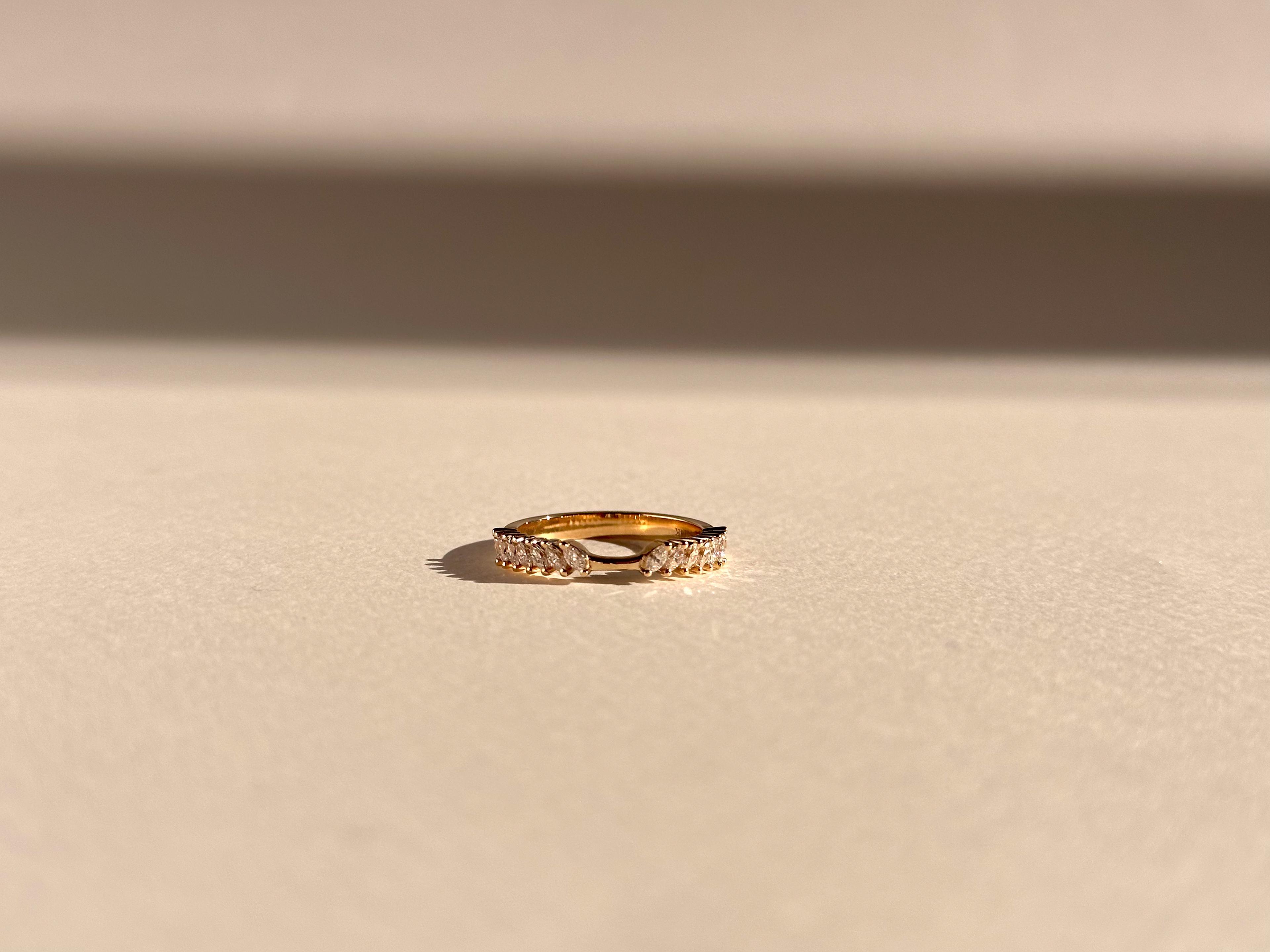 Rose gold wedding ring with marquise diamond