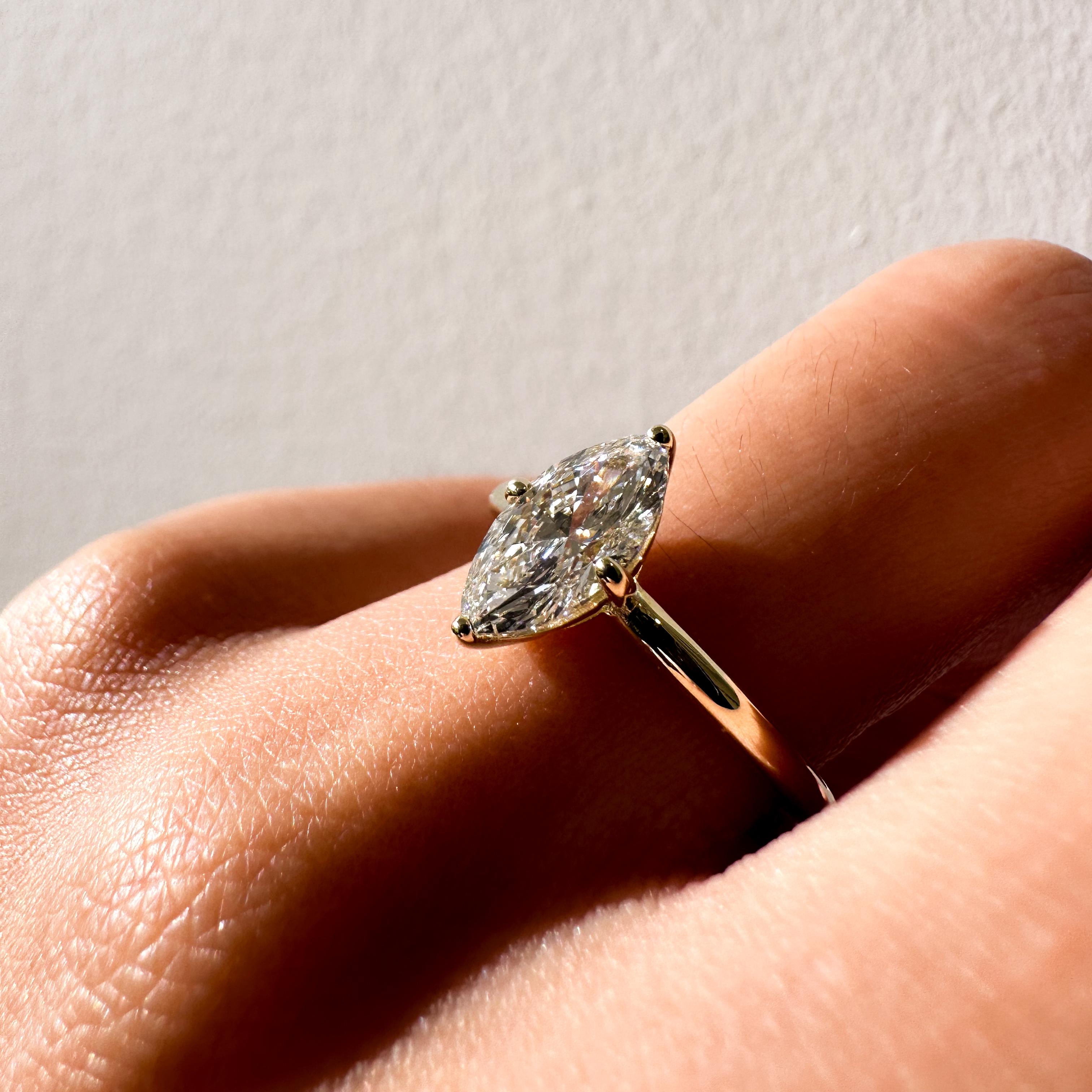 2 carat marquise diamond with a 14K yellow gold band