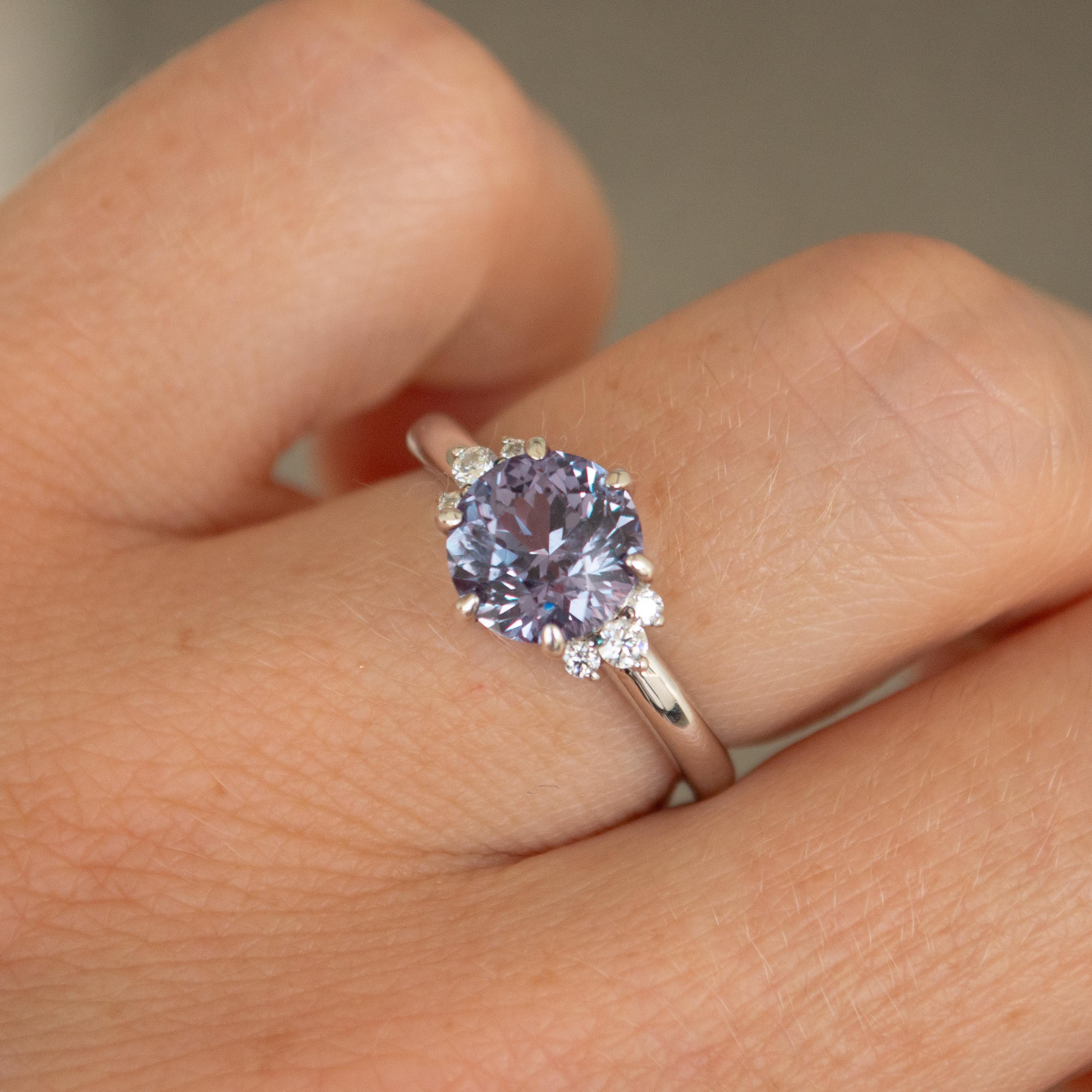2 Carat Round Brilliant Cut Lilac Sapphire Featuring 6 Accenting Lab Grown Diamonds