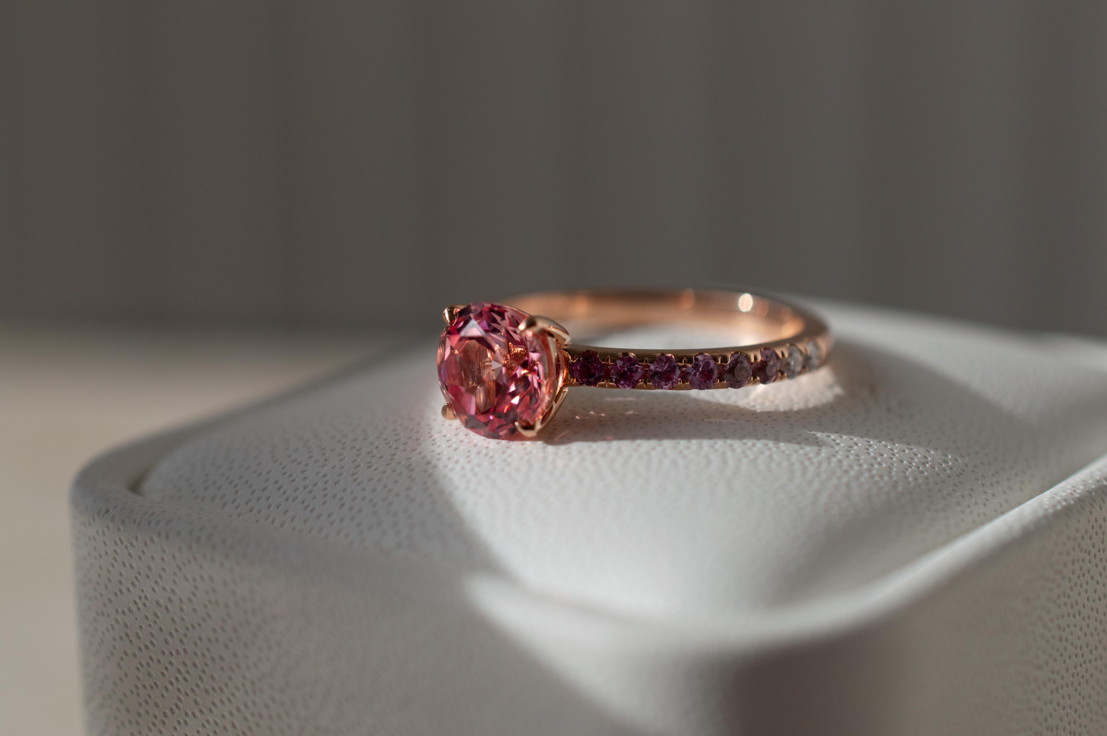 Round pink sapphire engagement ring in yellow gold with pink diamond pave 